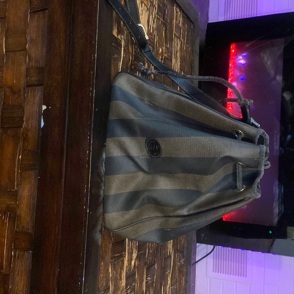 Authentic vintage Fendi bag need minor repair to strap otherwise a great bag!